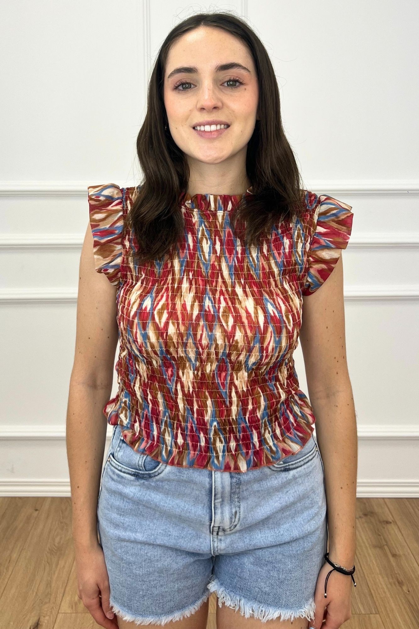 BLUSA FRUNCE ESTAMPADA ROJA